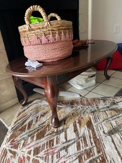 Brown oval coffee table