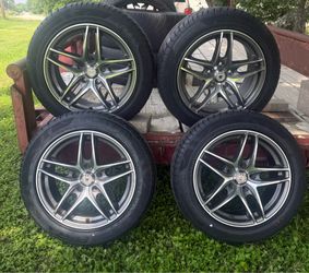 16” rims 5 lugs with new tires