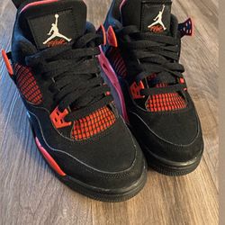 Red Thunder Jordan 4s