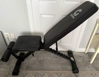 Work Out Bench.   Adjustable.   Folds Up