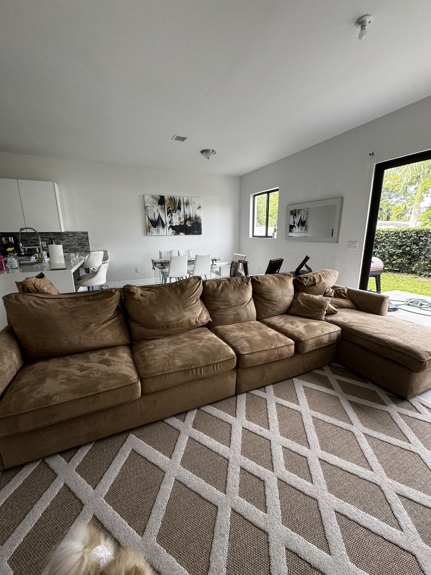 8 seater sofa that converts into a bed with an armchair