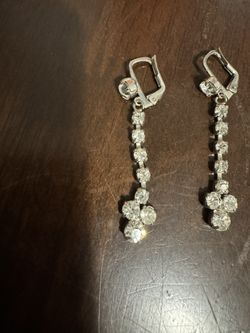 Cross hanging earrings with stones In silver