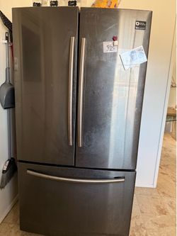 Free refrigerator needs work