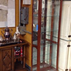 Four Tier Curio Cabinet For Sale 