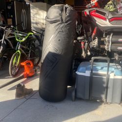 Barely used 100 lb punching bag