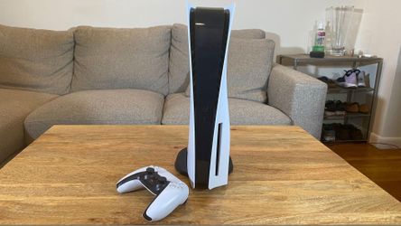 PS5 with two controllers
