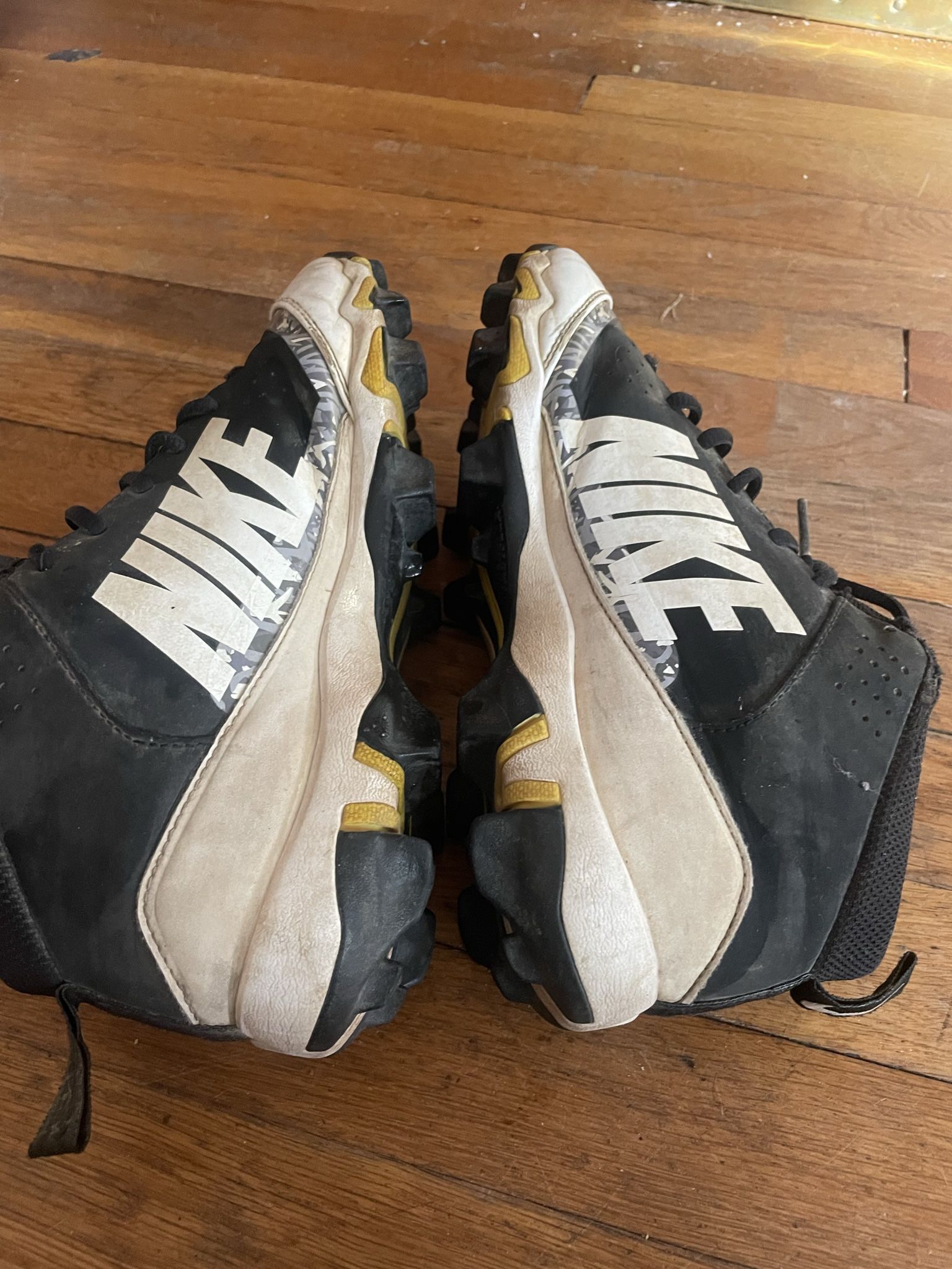 Nike Baseball Cleats Plastic And metal . Easton Baseball Bats
