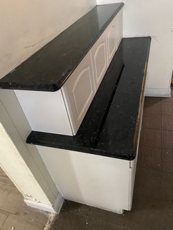 White Kitchen Cabinets with Black Granite Countertop