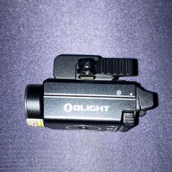 Olight BALDR S with Green Laser