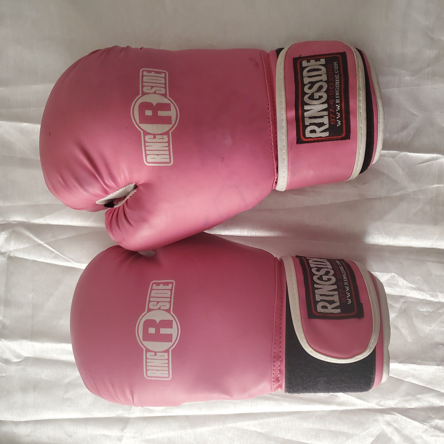 2 sets of boxing gloves