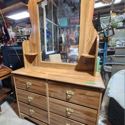 Perdue Dresser with mirror 
6 drawers, still smells like wood!