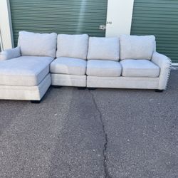 Modern Light Gray Sectional Sofa with Matching Armless Chair – Excellent Condition