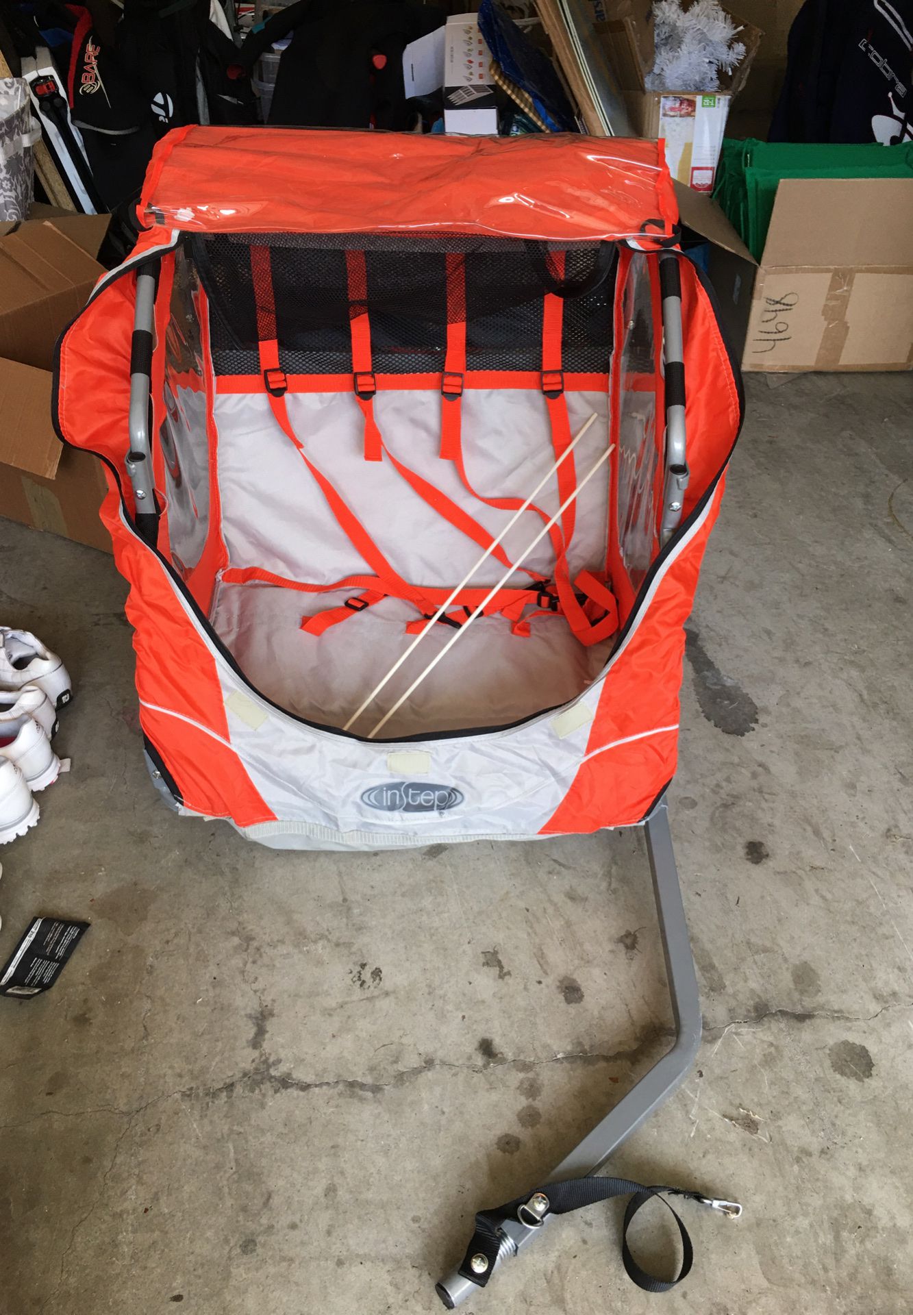 Instep Bike Trailer, double, orange, only used twice. Sells for $150 new, will sell for $70.