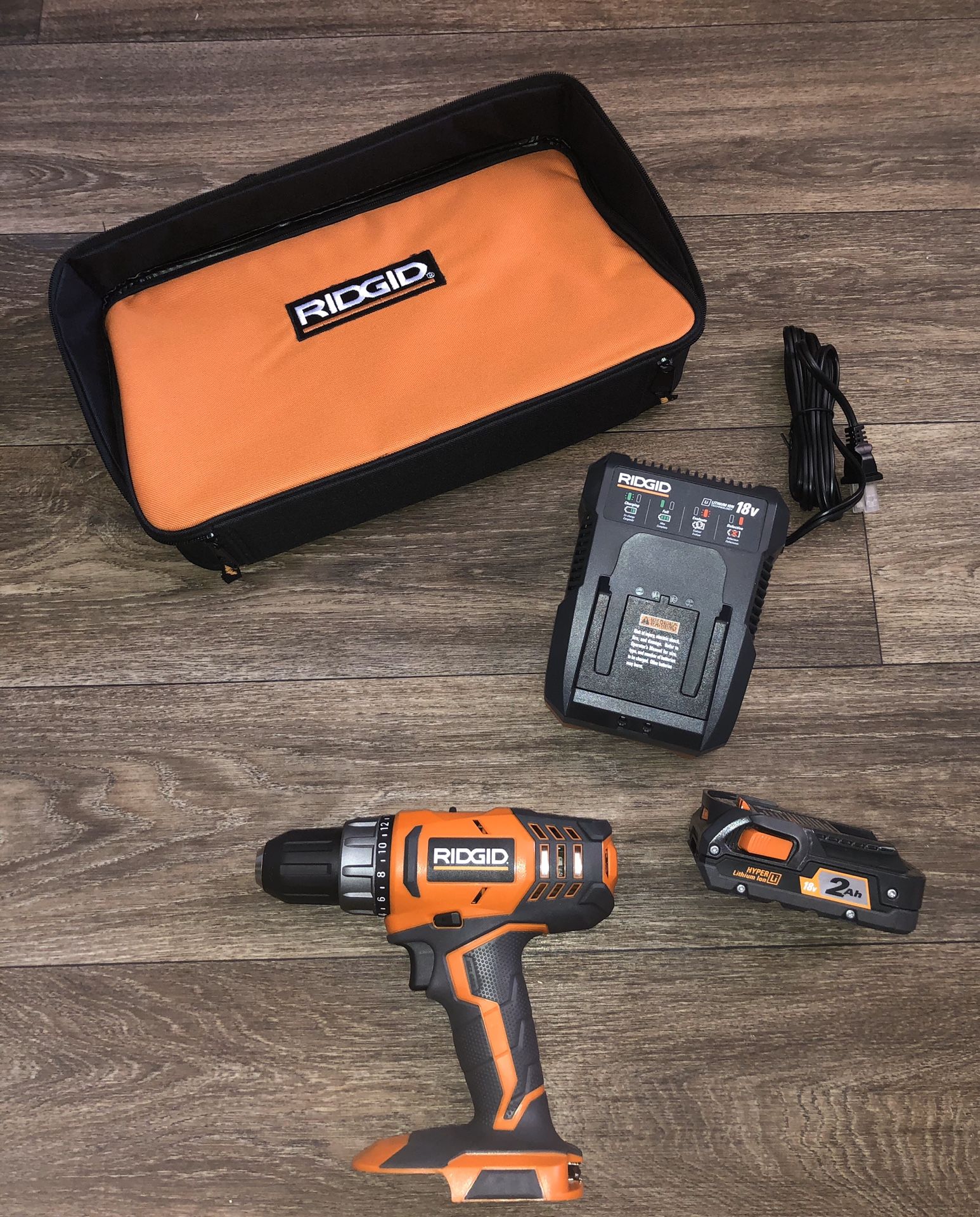 RIDGID 18-Volt Lithium-Ion Cordless 2-Speed 1/2 in. Compact Drill/Driver Kit with (1) 2.0 Ah Batterie, Charger, and Tool Bag
