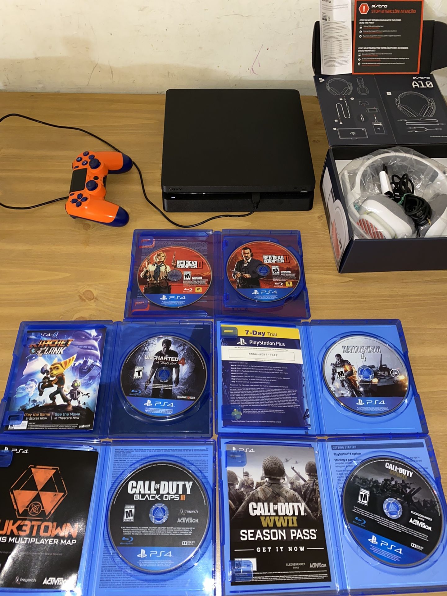 Black Ps4 Slim 1TB W/ Games, Headsets, One Custom Controller, And 7 Day PS Plus Trial