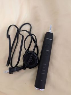 Aquasonic electric toothbrush