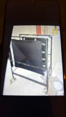 Twins size folding bed with wheels—like new