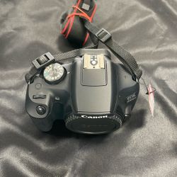 Canon EOS 2000D digital SLR camera body. 