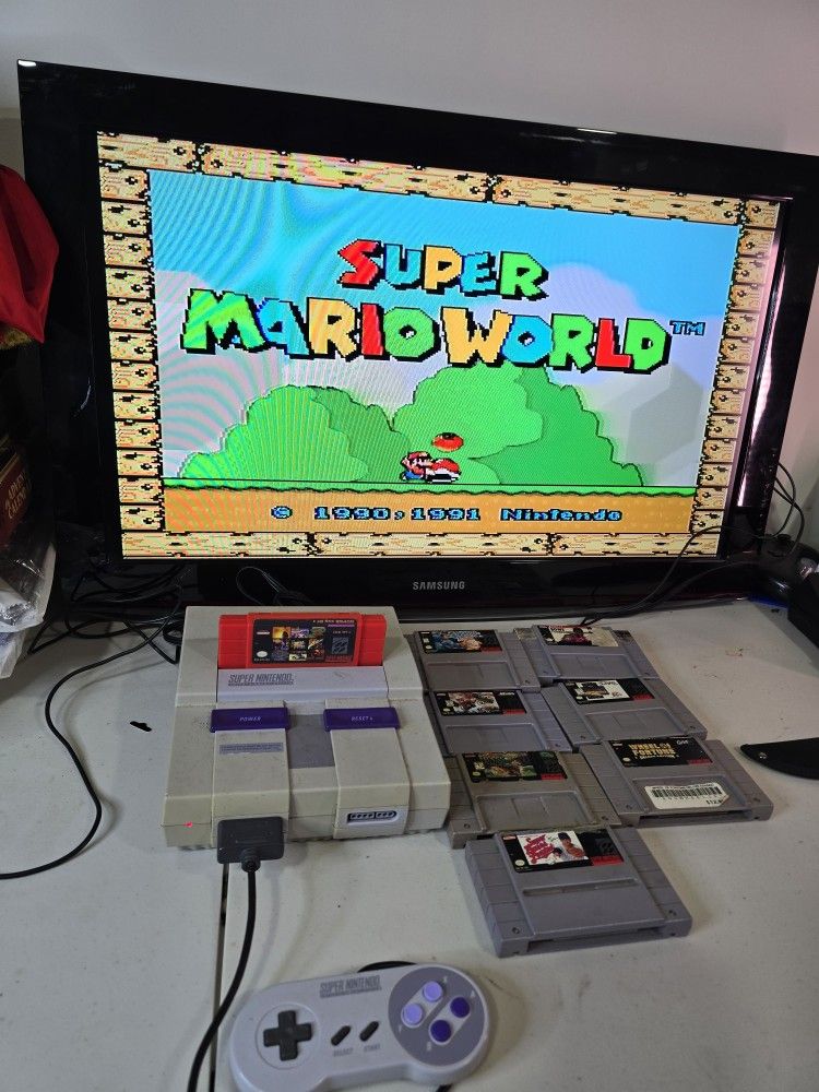 Super Nintendo console bundle With RARE multi packed game