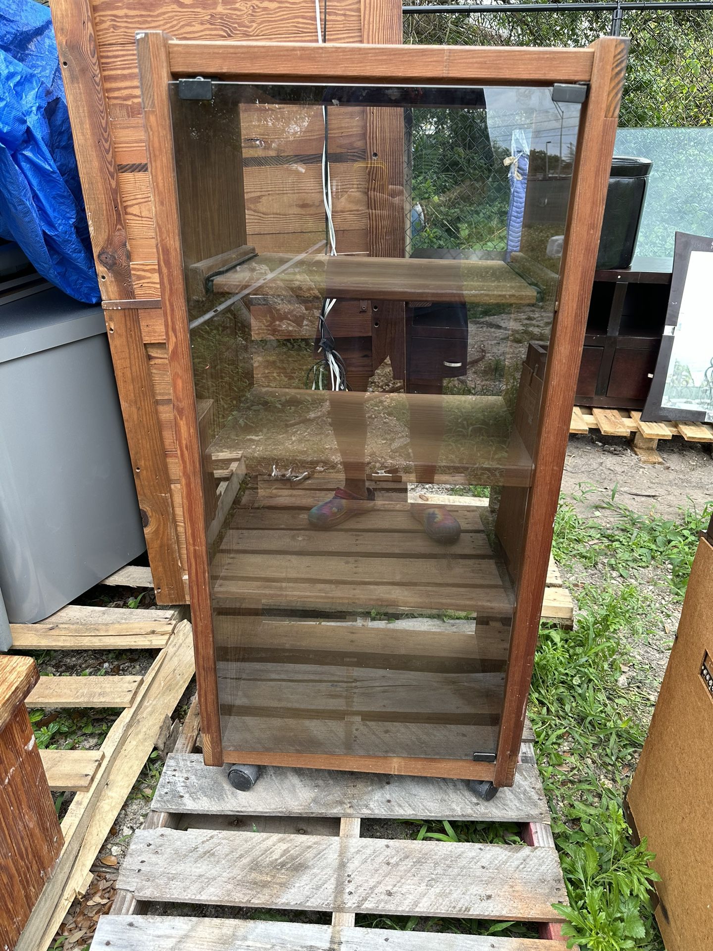 Wood Display Cabinet With 4 Shelves And Glass Door In Front, On Wheels