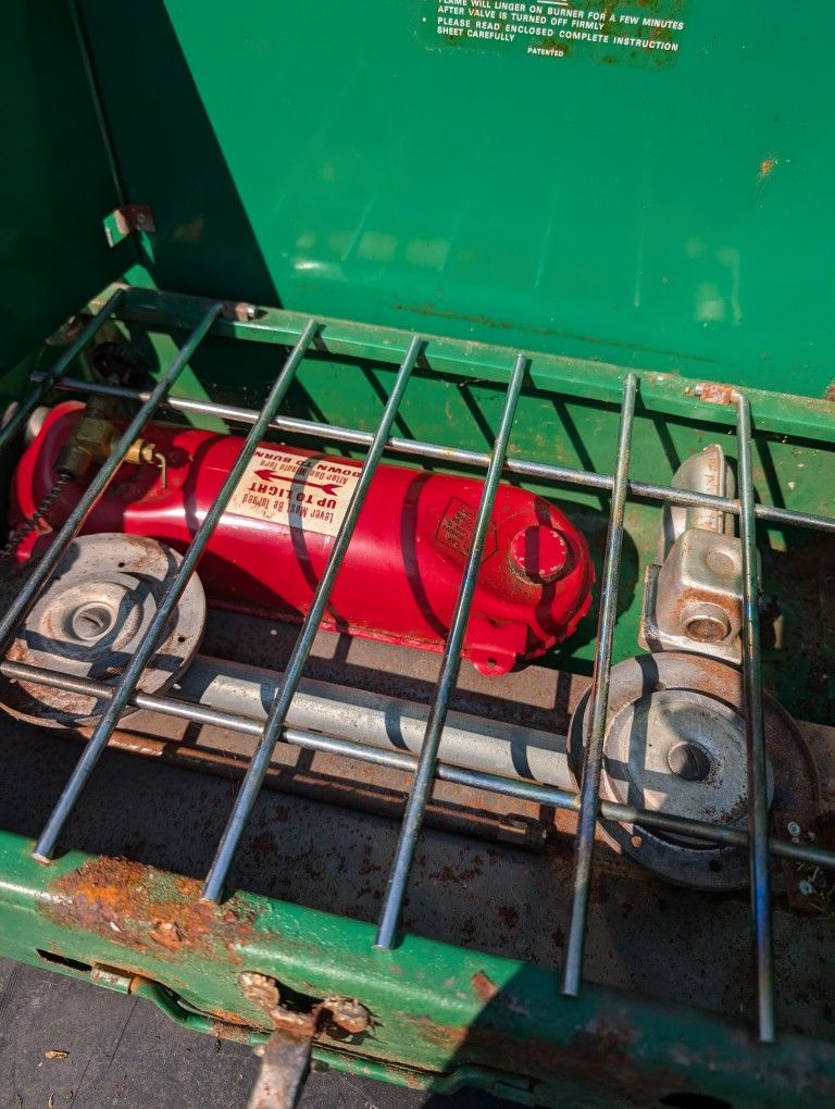 Coleman Fuel Camping Stove. One Hinge Is Broke, Not That You Need It. I Wiped It + Paint Came Off