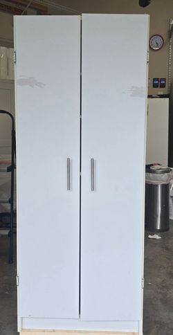 2 garage cabinets $40