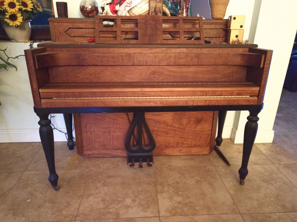 Upright Piano With Beautiful Walnut Vaneer