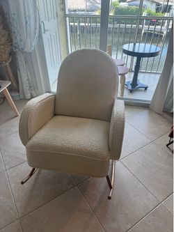 Nursery Works Compass Rocker in Ivory Boucle with Rose Gold Legs $475