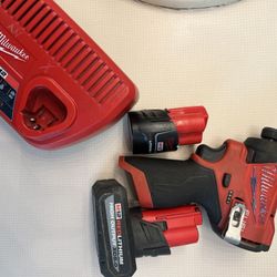 Milwaukee fuel brushless impact with 5.0 output battery 2.0ah battery and lightning charger