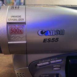 Canon ES55 camcorder comes with charger