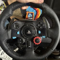 Logitech g29 steering wheel and Next level racing gt light foldable chair