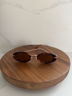 Rose gold oval sunglasses