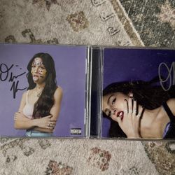Signed Olivia Rodrigo Sour and Guts CD