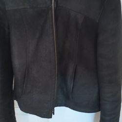 Beautiful Woman Real Leather Motorcycle Style https://offerup.co/faYXKzQFnY?$deeplink_path=/redirect/ With Black Fur. Size M.  $52obo