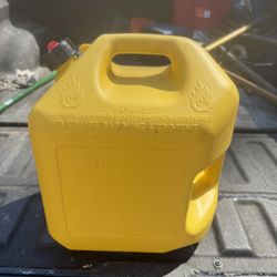 5-gallon yellow plastic container designed for storing and transporting diesel fuel