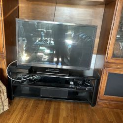 Flat Screen Tv And Black Entertainment Center