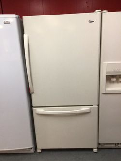 Used Amana bottom freezer fridge. 1 year warranty