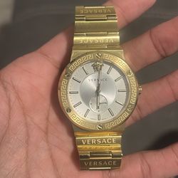 Gold Versace watch