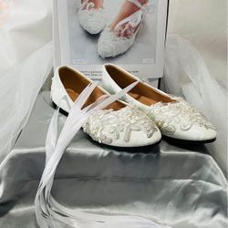 Woman’s Flats With Floral Lace