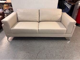 Leather love seat and arm chair set