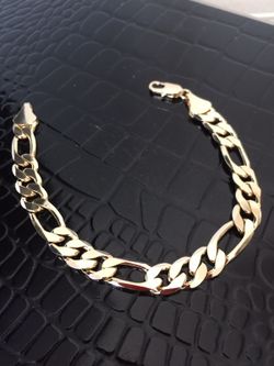 Figaro style 14k bracelet