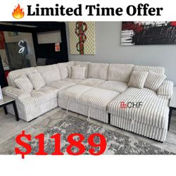 Beige Corduroy RIGHT HAND FACING Chaise Storage Corduroy Fabric Upholstered U-Shaped Sectional Sofa with Pull Out Bed and 6 Throw Pillows.