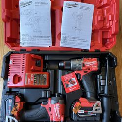 Milwaukee M18 Fuel Brushless 1/2”  Hammer drill and 1/4” 4-speed Impact Driver combo with two 5.0