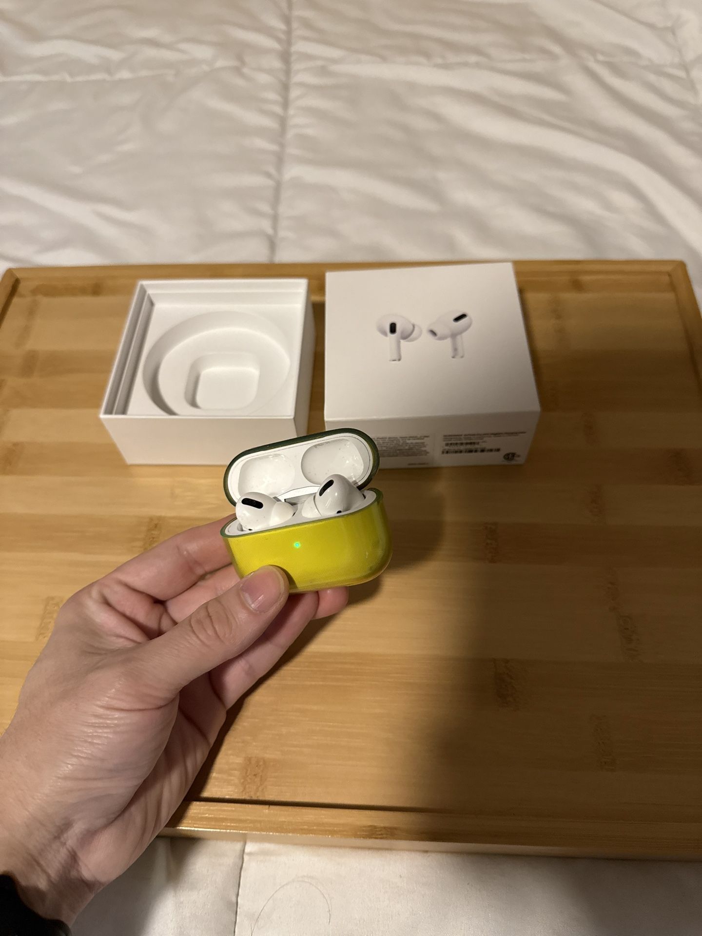 Pods Pro (Gen 1) + Original Charging Case – Working, With Minor Audio 