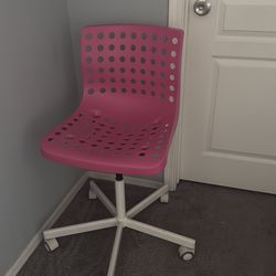 Pink plastic chair