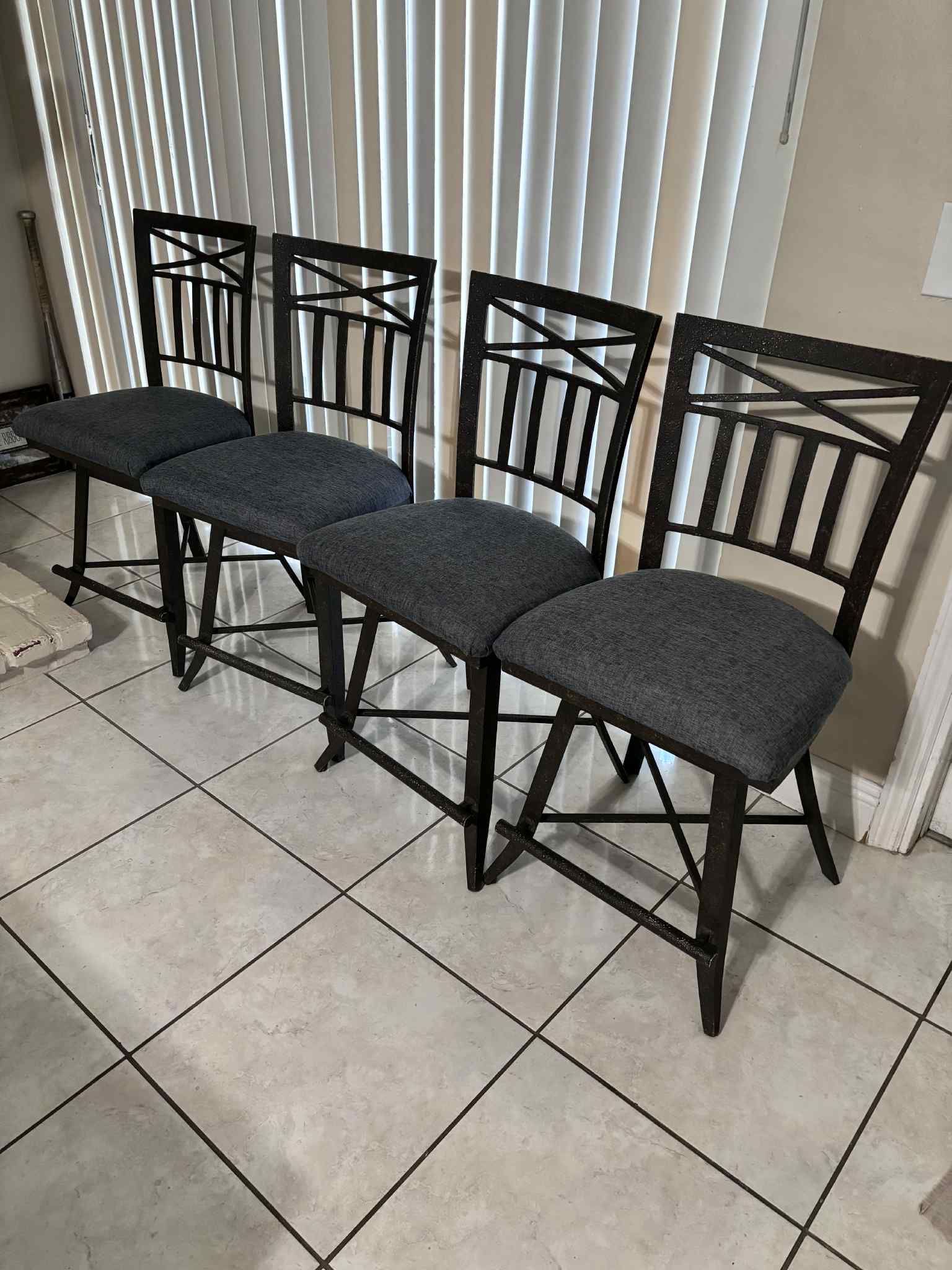 4 Wrought-Iron Swivel Bar Stools