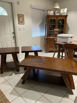 Coffee table and two side tables made of wood