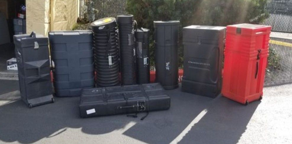 Various Hard Cases, most with wheels, locks, etc.