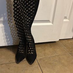 Black tall, see-through boots