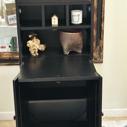 Absolutely gorgeous black,  space saving secretary desk with top drawer, drop-down desk with two shelve storage cabinet.   52” inches tall 12” inches 